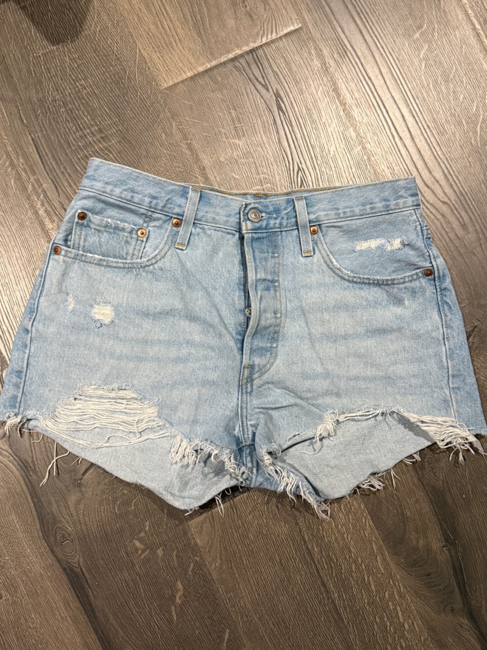 Levi’s Light Blue Distressed Denim Shorts